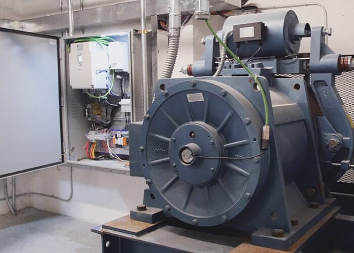 An Elevator Control Room with a Nidec Imperial gearless motor Operated by a Smartrise controller with a KEB drive and R6 Regen Unit
