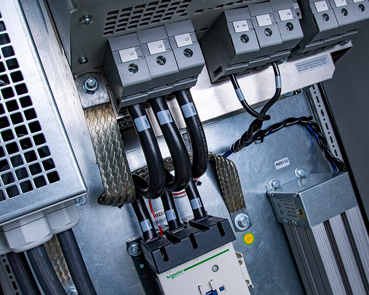 VFD power cable grounding strap in a high speed VFD control panel