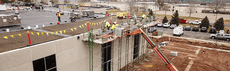 Masonry work on existing building wall