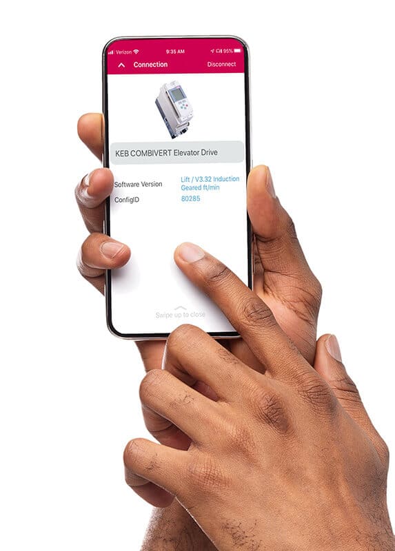 A mobile phone with the KEB Elevator App on the screen