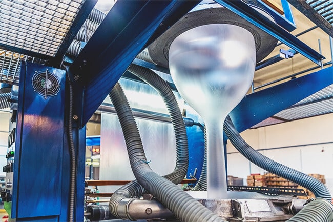 close up of a blown film extrusion-machine for the plastic bag industry-with-liquid-cooled vfds